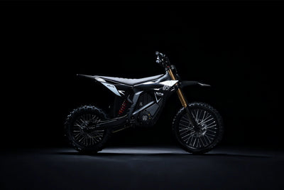 Black Sigma electric bike with gold front forks and rugged off road tires