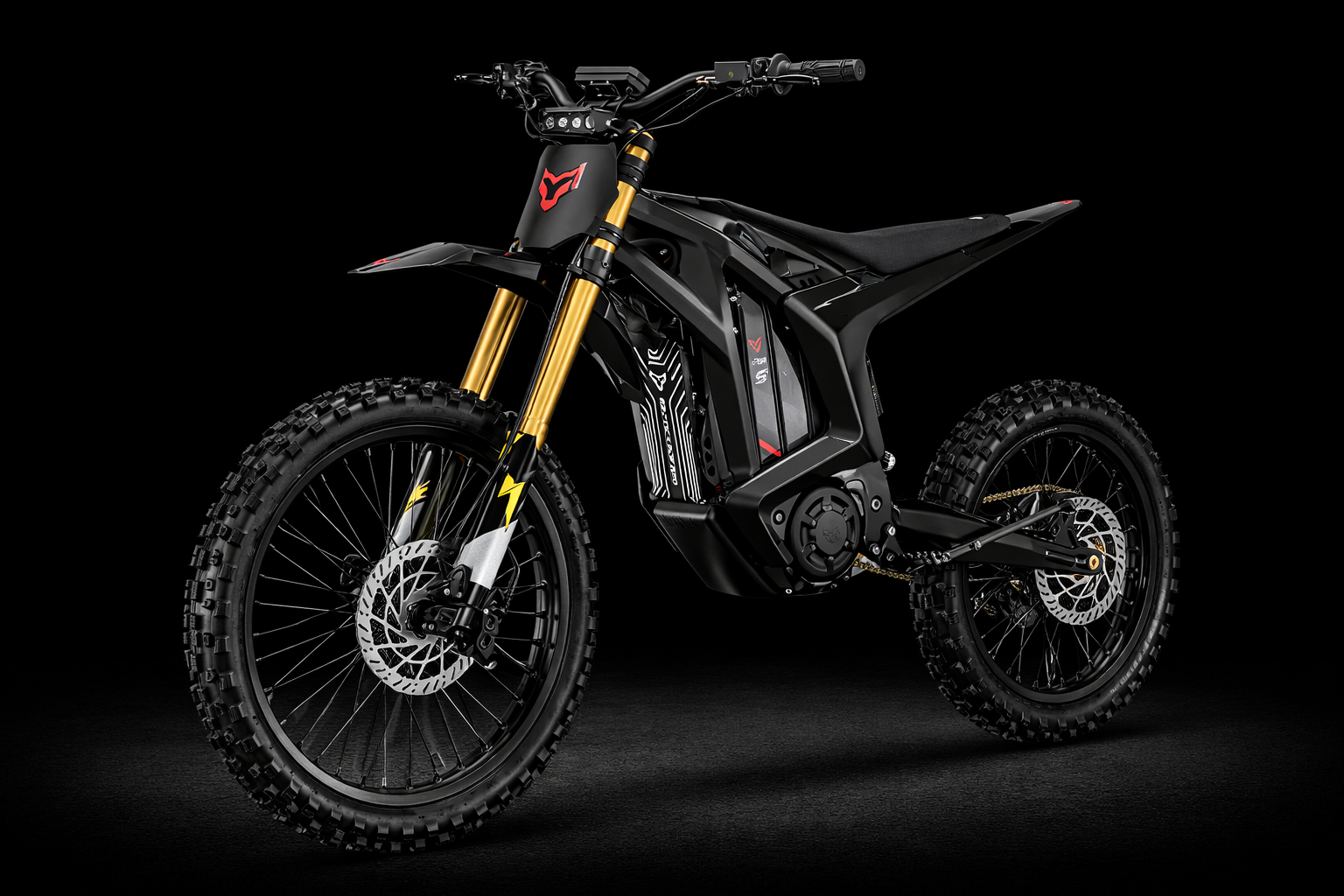 A sleek, all-black electric dirt bike with gold front forks and red wheel accents on a high-clearance frame.