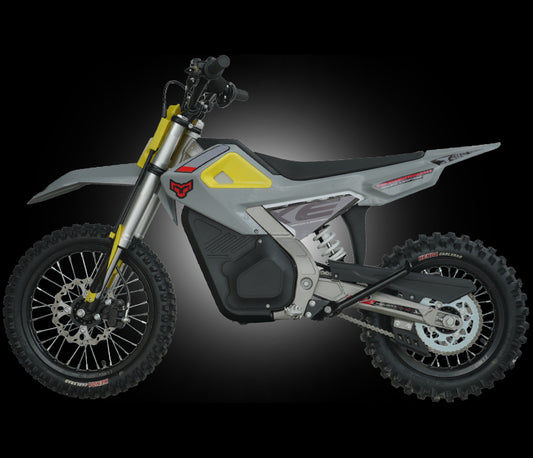 A grey and white EZ Pro Little Leopard with bright yellow accents, knobby off-road tires, and a black seat .