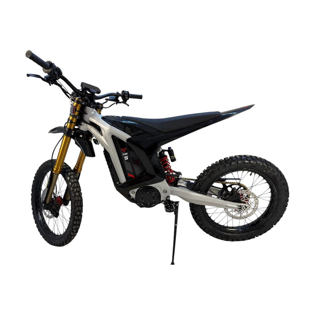 A sleek silver and black electric dirt bike with gold forks and a red rear spring.