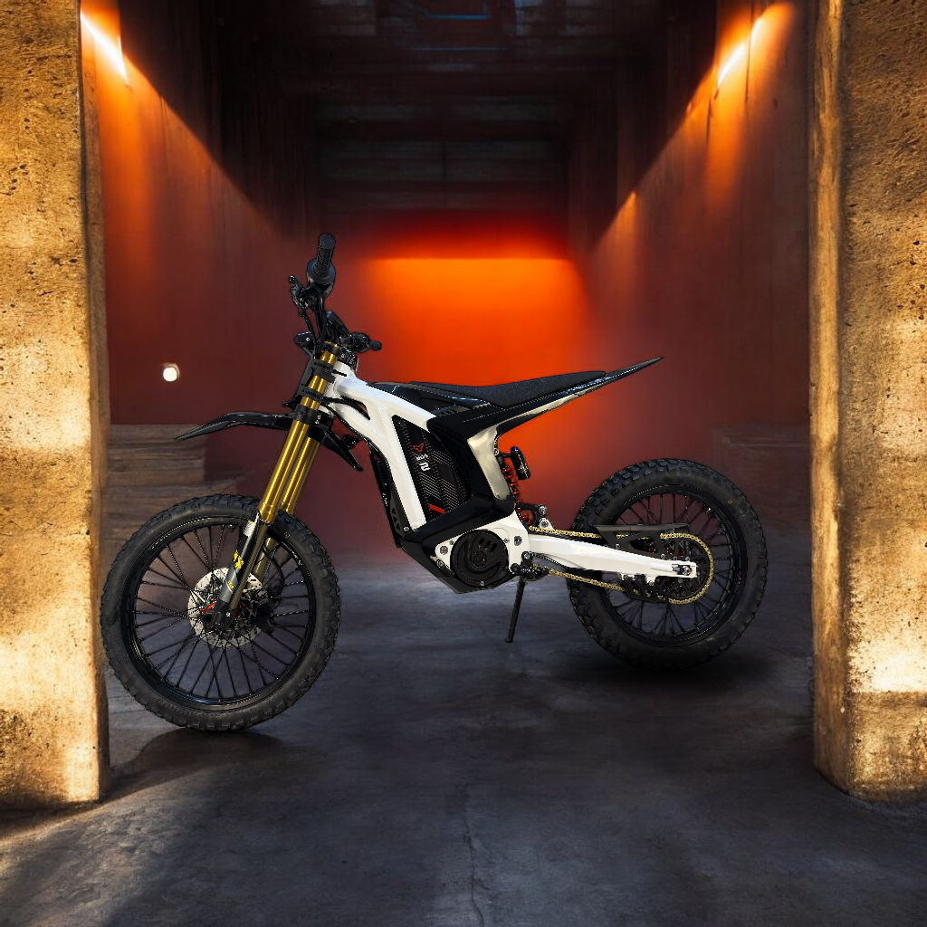 A sleek white and black electric dirt bike with gold front forks set on a high-clearance frame, surrounded by a misty background.